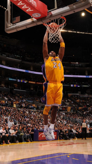 Basketball player dunking stadium crowd 2 - the sideline free wallpaper