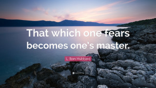 Rocky shore sunset quote image 2 - a sunset in the background and a quote free wallpaper