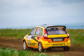 Small yellow car dirt road - andrey ryabovichev free wallpaper
