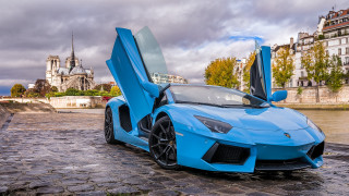 Blue sports car cobblestone road - andrew law free wallpaper