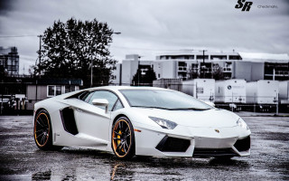 White orange sportscar parkinglot cloudy - andrew law free wallpaper