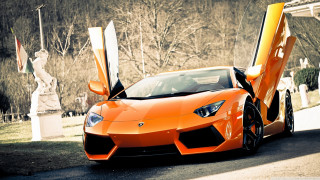 Orange sports car parked street 4 - nice free wallpaper