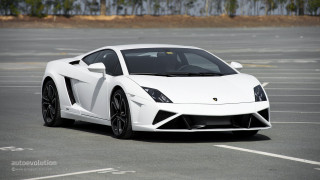 White sports car parking lot 38 - a parking lot free wallpaper