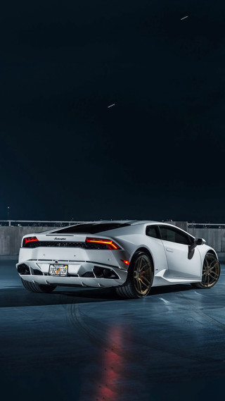 White sports car full moon - a dark sky free wallpaper