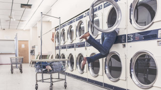 Laundry room man hanging washing - les automatiste free wallpaper