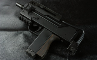 Gun black leather background vector - vector free wallpaper