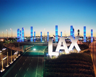 Lax city skyline nighttime lights - a large sign free wallpaper