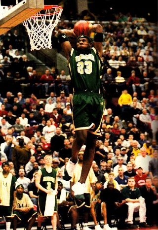 Man dunking basketball crowd stadium - a stadium free wallpaper