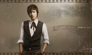 Man vest tie filmstrip camera - a man in a vest free wallpaper