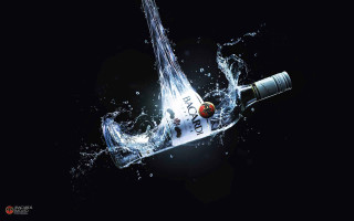 Vodka bottle splash water dropping - real free wallpaper