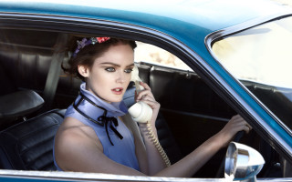 Woman sitting car talking phone - a phone free wallpaper