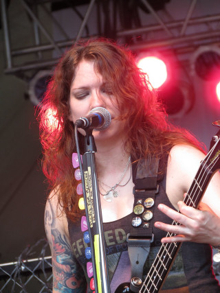 Woman long hair playing guitar 3 - a guitar free wallpaper