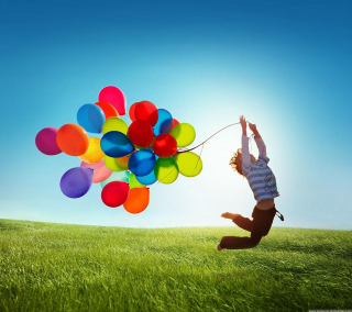 Person jumping balloons blue sky 5 - cheerful free wallpaper