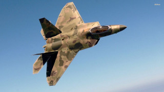 Camouflaged fighter jet blue sky 4 - a propeller free wallpaper