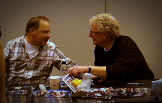 Two men sitting table food - drew struzan free wallpaper