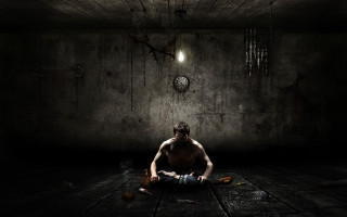 Man sitting dark room clock 6 - the wall behind free wallpaper