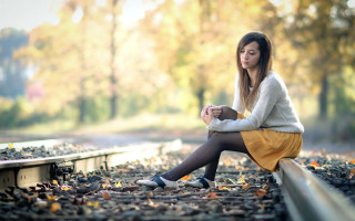 Train track woman autumn blurry - portrait photography free wallpaper