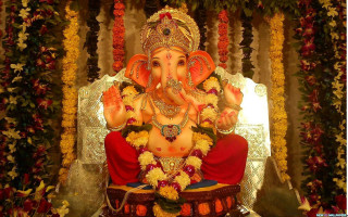 Ganesha statue flowers garland man - a red robe free wallpaper