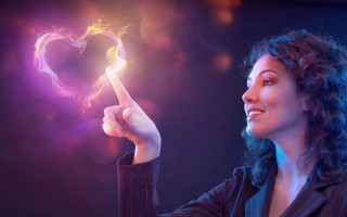 Woman holding heart shaped object 2 - object in the middle free wallpaper