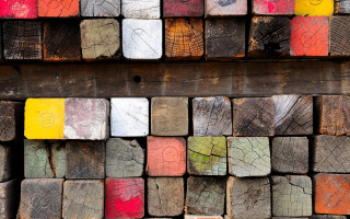 Wood pile colored squares sign - side and a sign free wallpaper