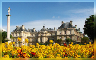 Large building statue field flowers - paris school free wallpaper