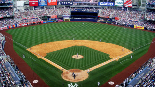 Baseball field crowded stands people - a baseball field free wallpaper