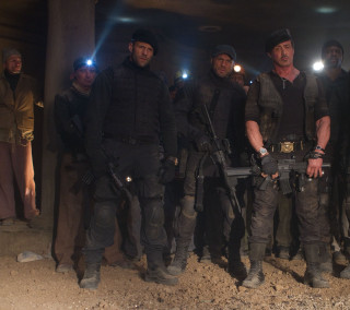 Men holding guns dark room - a group of men free wallpaper