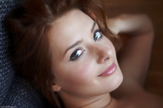 Woman blue eyes blue sweater - a blue sweater free wallpaper