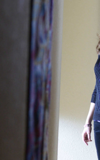 Woman standing room open door - movie still frame free wallpaper
