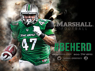 Football player green uniform holding - a football player free wallpaper
