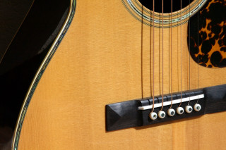 Guitar closeup black fret brown - a close up of a guitar free wallpaper