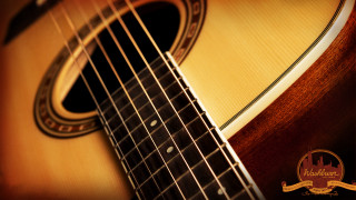 Guitar wooden back black white - a close up of a guitar free wallpaper