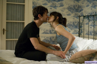 Romantic kiss bedroom blue walls - a man and a woman free wallpaper