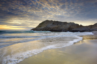 Beach rock formation waves person 2 - beach free wallpaper