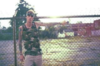 Man tattoo fence arms outstretched - a fence free wallpaper