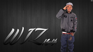 Man gray jacket hat wall - a wall free wallpaper for desktop