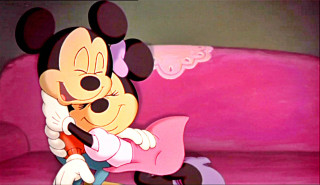 Cartoon hugging person pink couch - a couch in a living room free wallpaper
