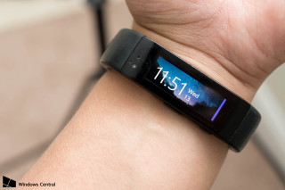 Person holding smartwatch clock screen - smart free wallpaper