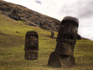 Carved faces grass hillside cloudy - cloudy free wallpaper