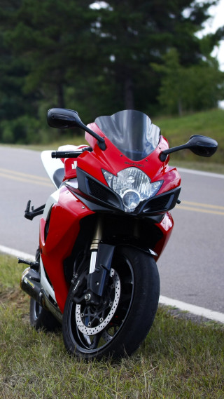 Red motorcycle road sign trees - a digital rendering free wallpaper