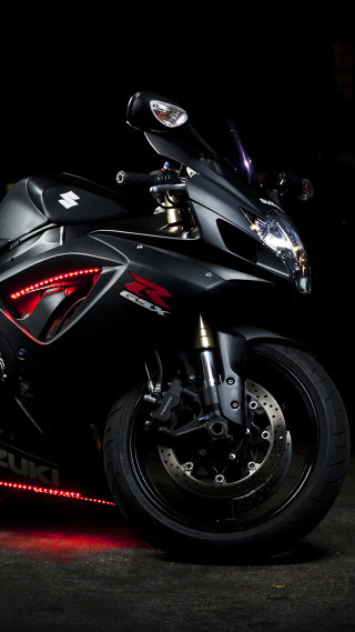 Motorcycle parked dark room lights - a motorcycle free wallpaper