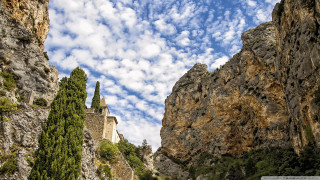 Castle cliff sky clouds trees - romanesque free wallpaper