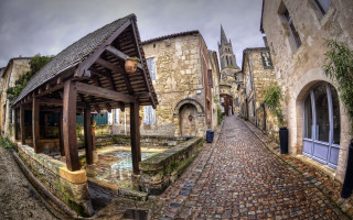 Cobblestone street water fountain clock - bernard meninsky free wallpaper