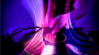 Person playing record turntable purple - a turntable free wallpaper