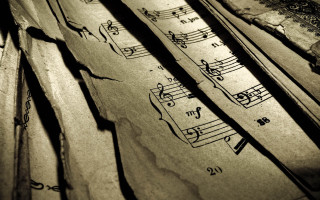 Musical notes paper pen close - a close up of a piece free wallpaper