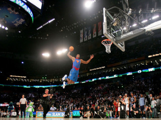 Man jumping dunk basketball stadium - dunk free wallpaper