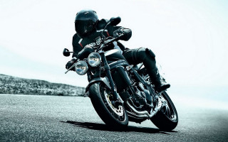 Motorcycle rider hill street sky - a sky background and a person free wallpaper