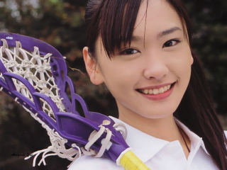 Woman holding purple lacrosse helmet - aaa game free wallpaper