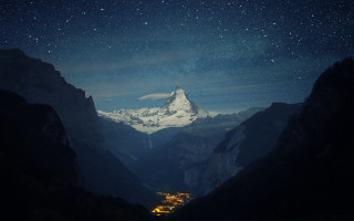 Mountain snow peaked city night - below free wallpaper