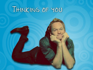 Man lying blue background smile - a blue swirl free wallpaper